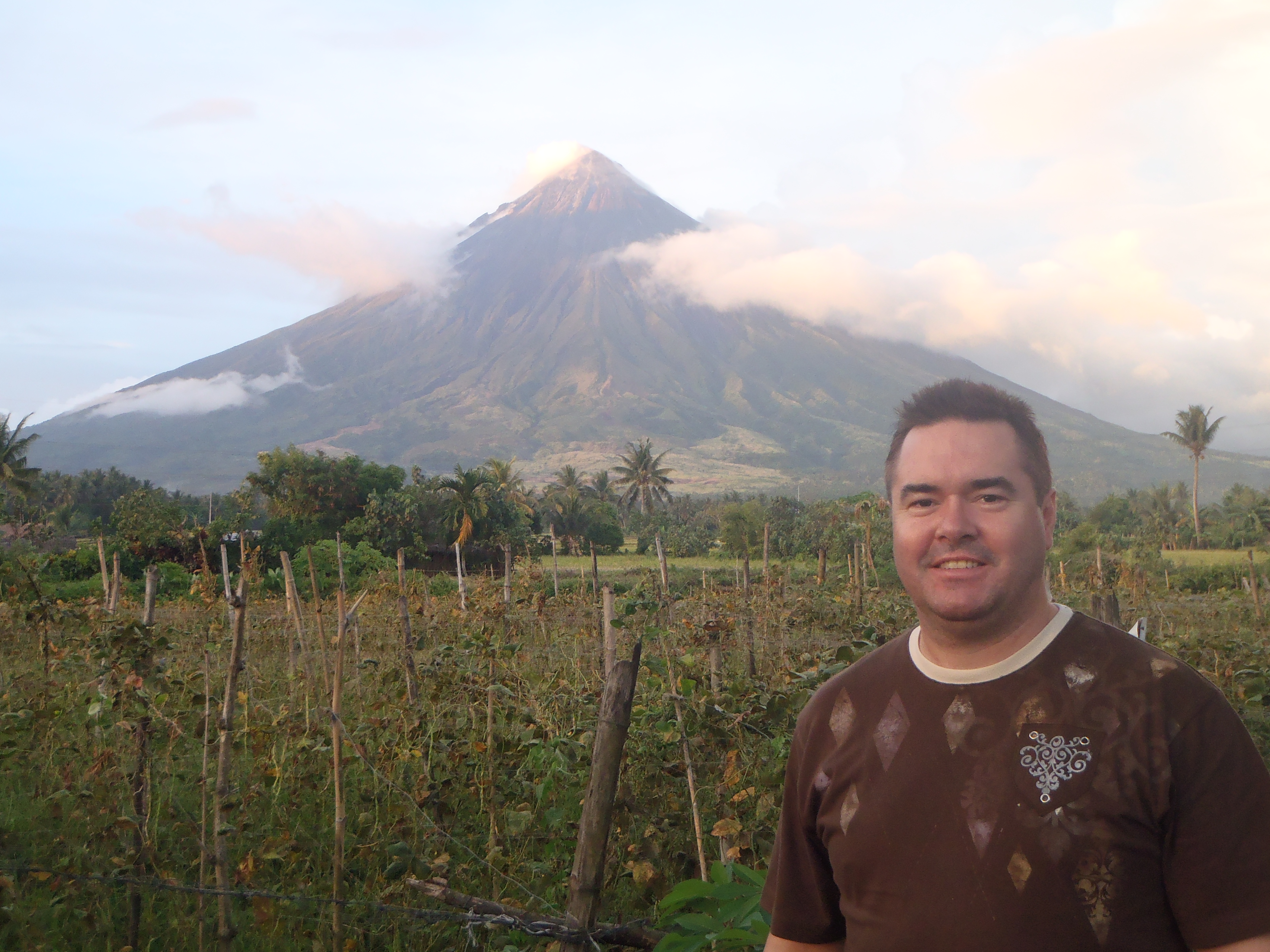 View of Mt. Mayon volcano from the western side with the sun setting